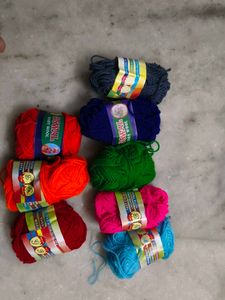 Assorted Yarn Balls and Crochet Hook