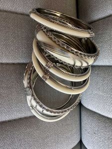 Set of Elegant White & Silver Bangles
