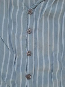 A S Size Ginger Top With Grey And White Stripes.