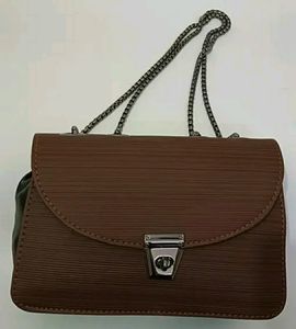 BROWN SOLID BUCKLE CHAIN SLING BAG (TOTALLY NEW)