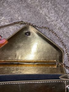 MANGO Gold sling Bag