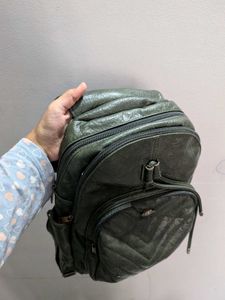 Stylish Green Backpack with Braided Detail