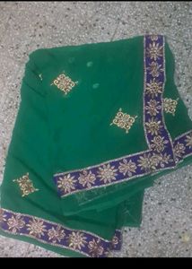 Elegant Green Saree with Embellished Border