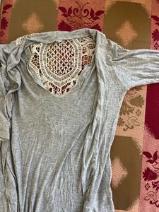 Gray long sleeve top with crochet detail