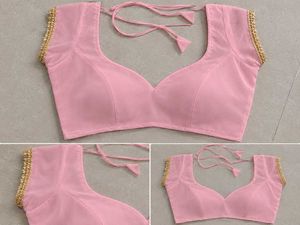 Elegant Pink Blouse with Embellished Sleeves