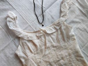 Chic White Eyelet Top style mini dress with Ruffle