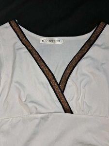 white ruched mini dress.