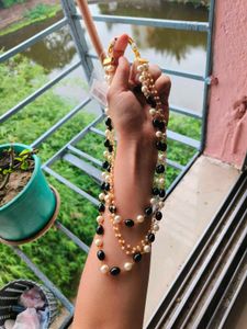Elegant Pearl and Black Bead Necklace