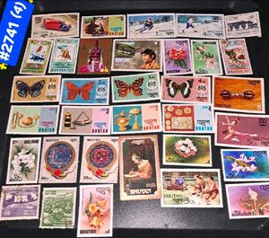 33 vintage Bhutan Stamp Collection