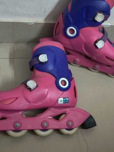 Pink &amp; Purple Roller Skates