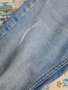 Light Wash Distressed Denim Jeans