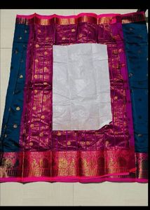 Stunning Teal Saree with Pink Border