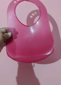 Pink Plastic baby bibs , food eating safety purose