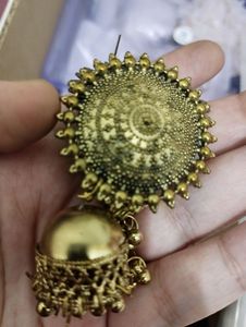 Golden colour long earings for party