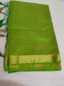 Vibrant Green Silk Saree with Golden Border
