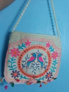 Embroidered Clutch with Tassels