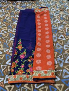 Orange Saree with Blue Blouse