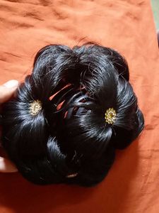 Elegant Hair Bun with Embellishments