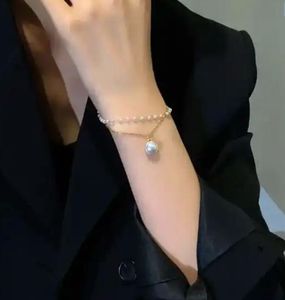 Elegant Pearl Charm Bracelet
