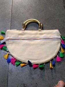 Embroidered Clutch with Tassels