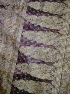 Elegant Purple Saree with Gold Motifs