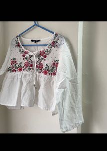 White Peplum Top