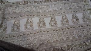 Elegant Nude Saree with Deer and Peacock Print