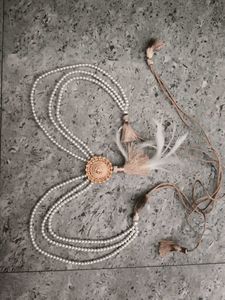 Elegant Pearl Necklace with Tassels