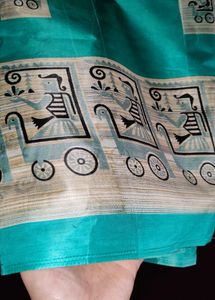 Elegant Teal Silk Saree with Unique Print