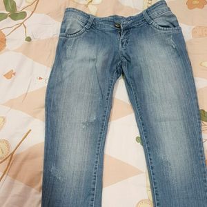 Light blue ripped jeans