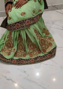 heavy party wear saree Light Green Embellished