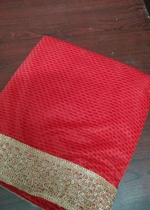 Red Net Or Chiffon Saree With Attached Blouse Piec