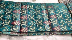 Elegant Teal Floral Brocade Saree