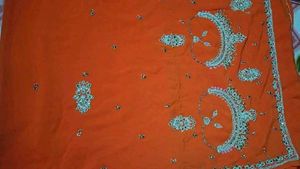 Exquisite Orange Embroidered Saree
