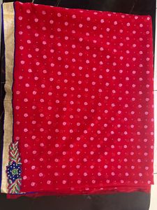 Vibrant Red Saree with Floral Embroidery