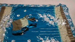 Stunning Teal Blue Saree with Silver Embellishment