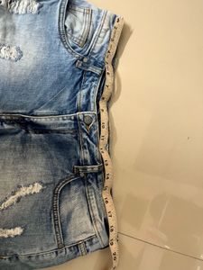 Distressed Light Wash Denim Shorts
