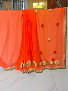 Vibrant Orange Embroidered Saree