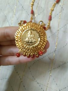 Elegant Gold Chain with Red Beads