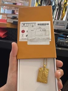 Gold Toned Pendant Necklace