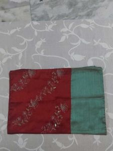 A dual-tone Embroidered Silk Cushion Cover