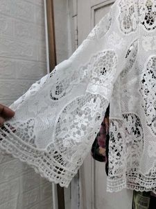 white lace top. bell sleeves