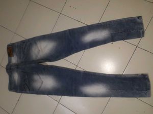 Distressed Blue Denim Jeans