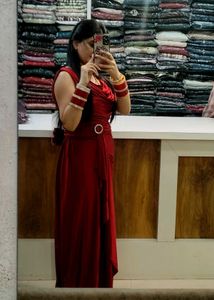 Elegant Red Gown with Embellished Waist