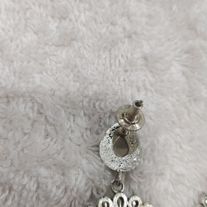Silver lookalike peacock earing