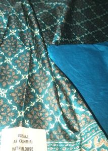 Elegant Teal Saree with Traditional Print