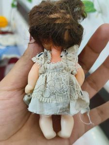 Vintage Doll with Brown Hair and Blue Eyes