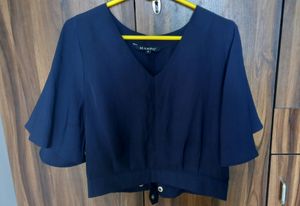 Blue Top With Flared Sleeves..