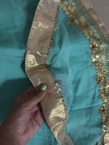 Elegant Teal Saree with Golden handwork  Border