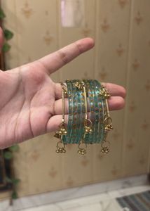 Elegant Teal Bangles with Golden Charms